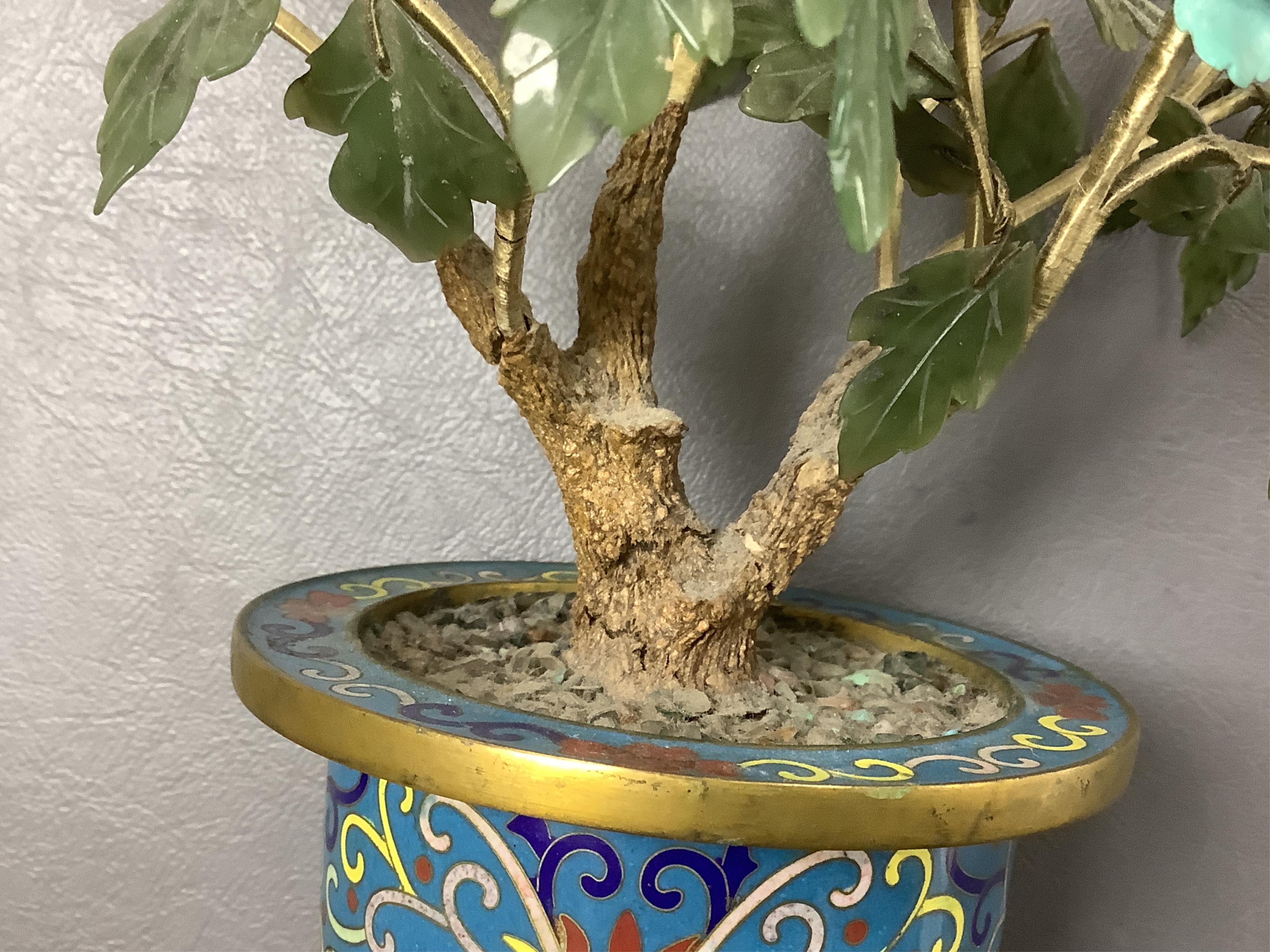 A pair of Chinese hardstone trees, in cloisonne jardinieres, 23cm high